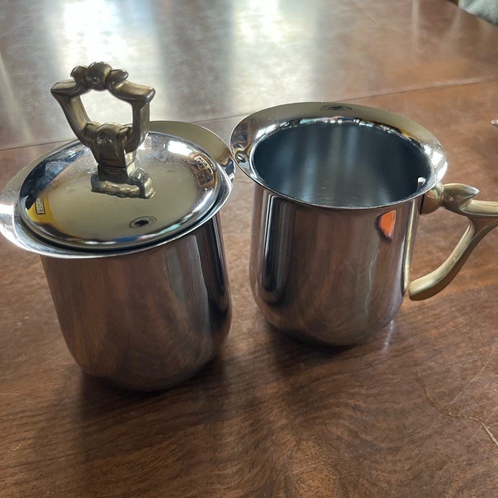 Elegant Silver and Brass accent Creamer Set